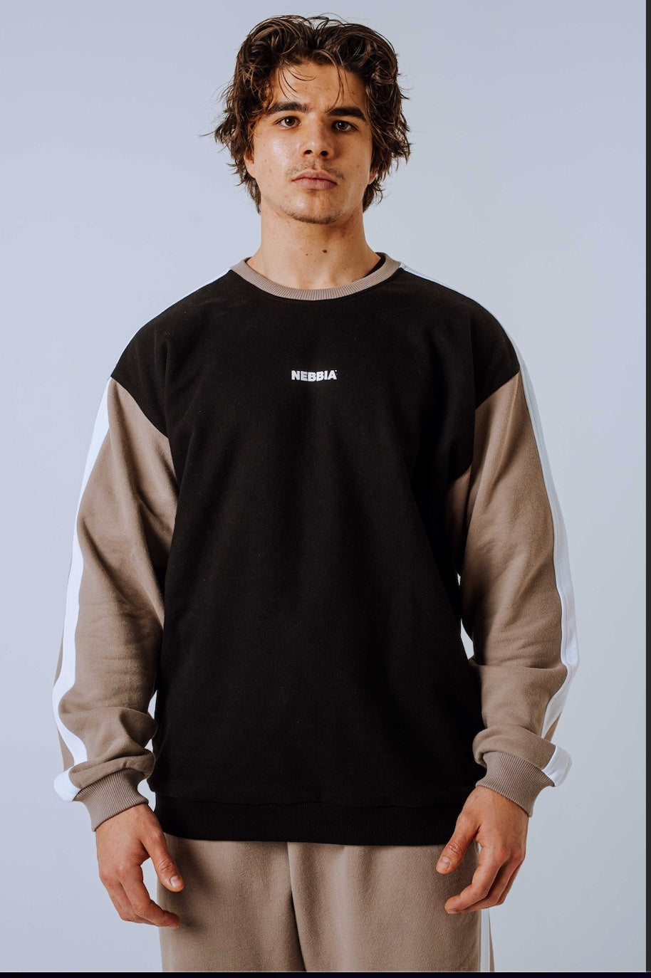 NEBBIA 903 Power Sweatshirt in Black and Light Brown Ash front view on an athlete.