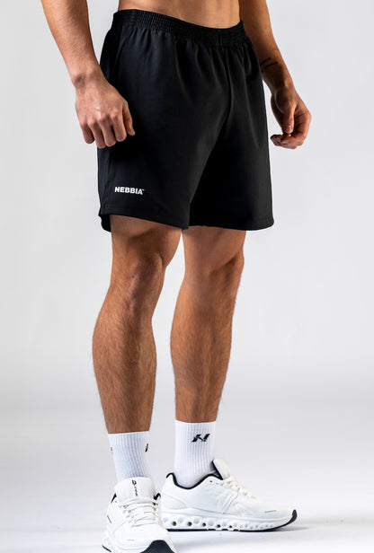 Front view of NEBBIA 902 Power Training Shorts in Black & Black on a muscular athlete.