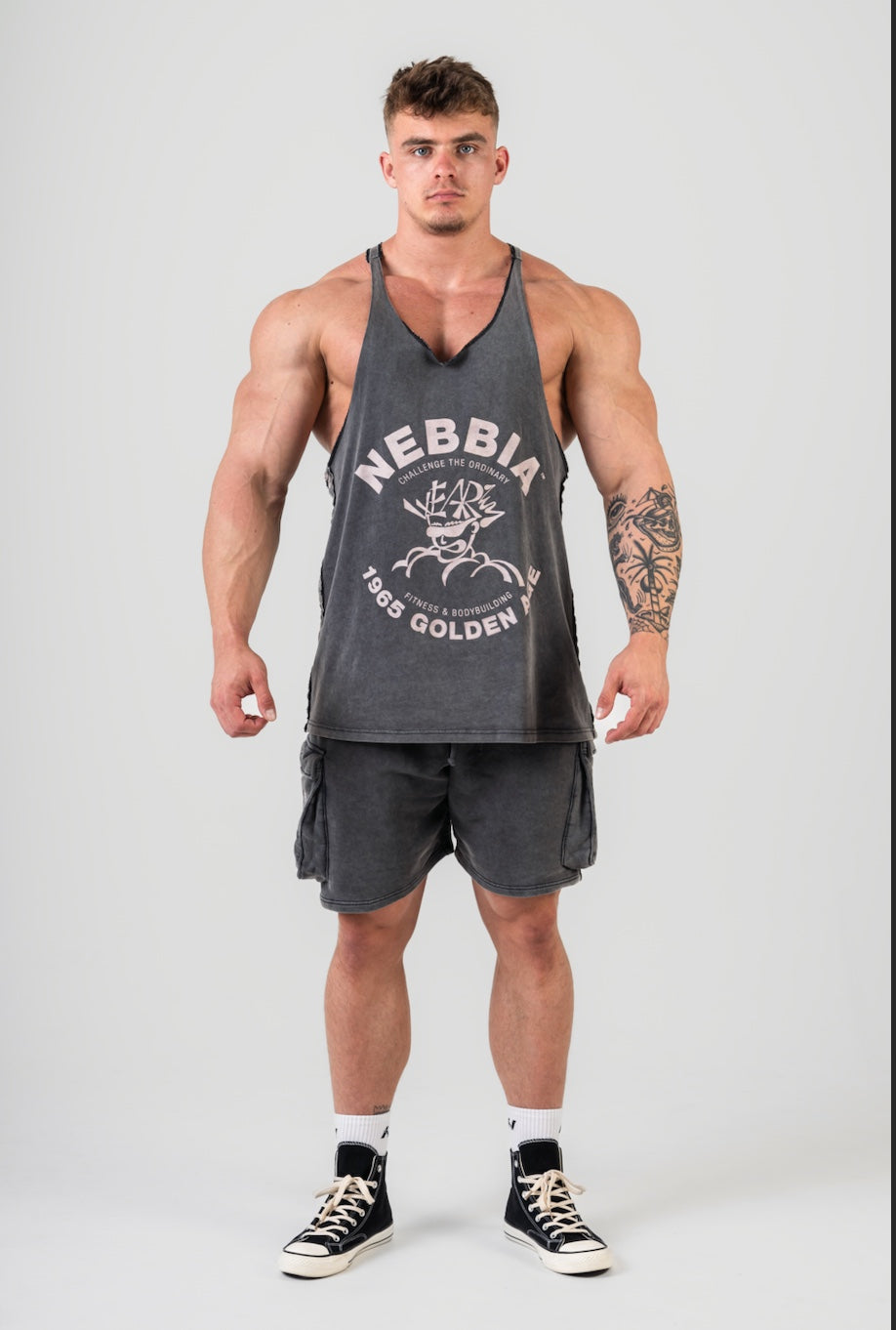 Front view of NEBBIA 791 Washed Muscle Back Stringer in Black, showing the vintage washed finish and Golden Era chest print.