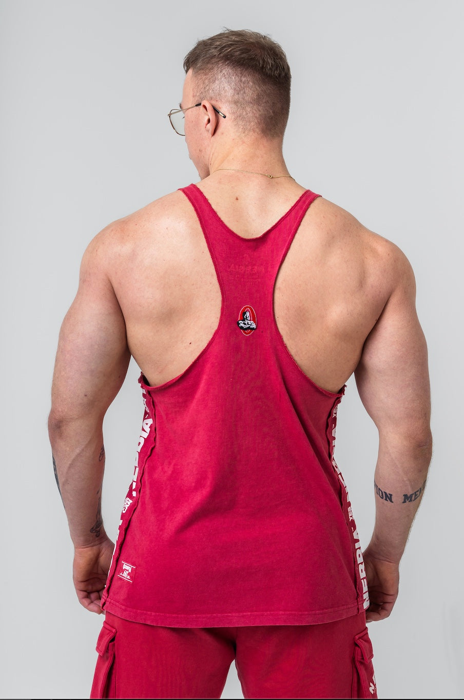 Back view of the 791 Muscle Back Stringer showing the thin Y-back strap design for optimal muscle display.