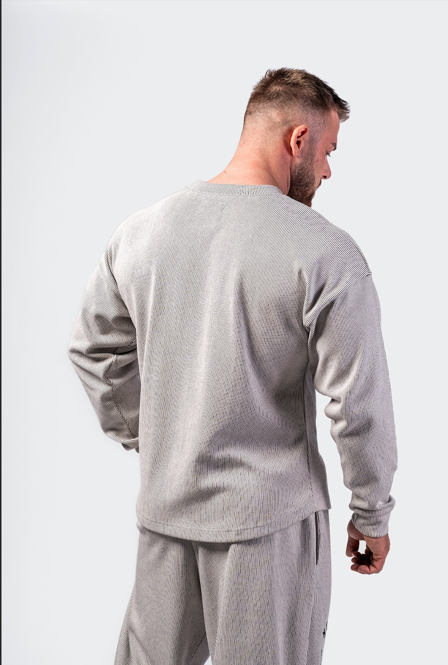 Side profile of the 797 oversized sweatshirt highlighting the boxy athletic silhouette and premium fabric thickness.