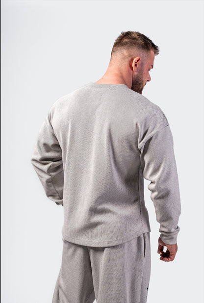 Side profile of the 797 oversized sweatshirt highlighting the boxy athletic silhouette and premium fabric thickness.