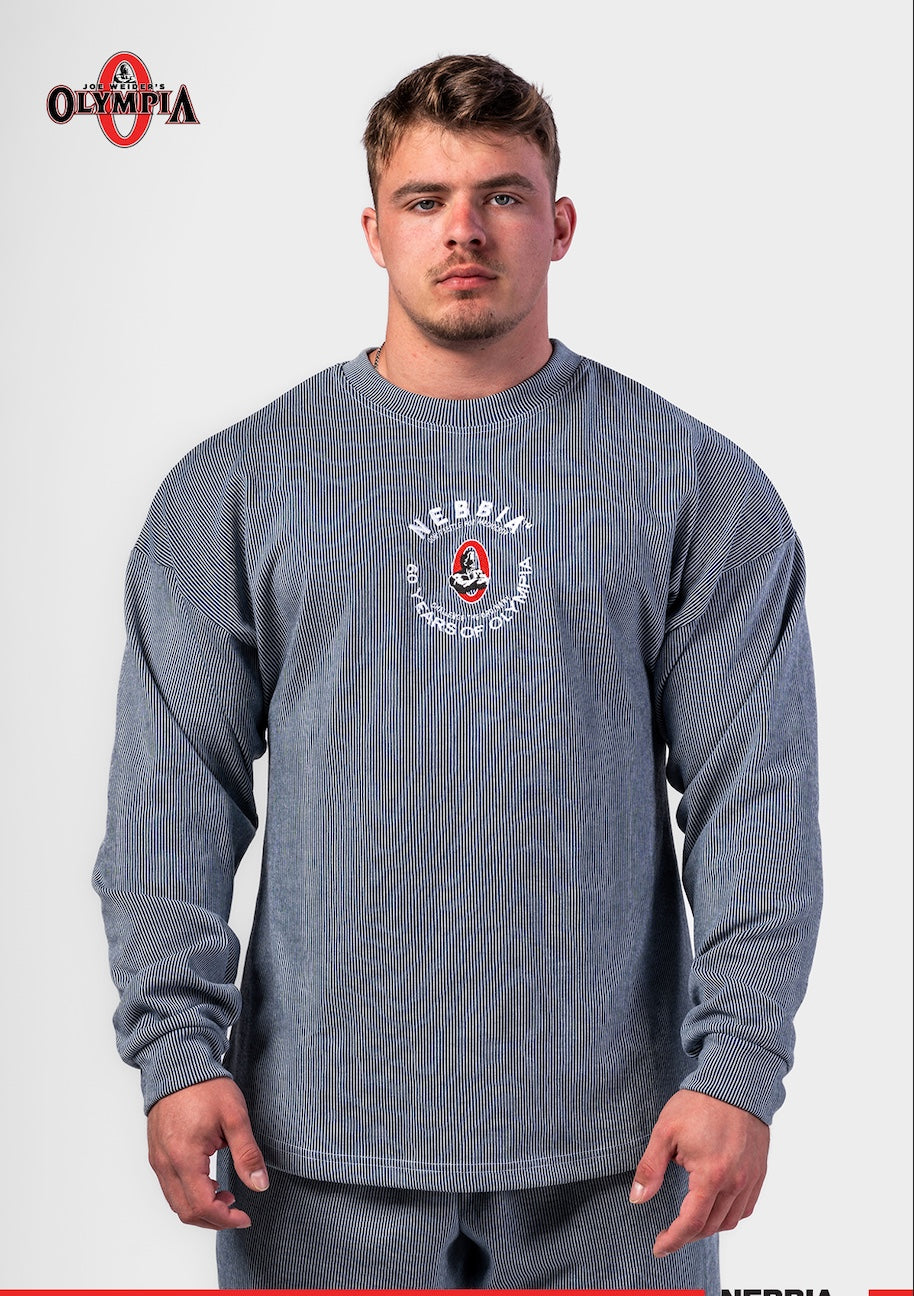 Front view of NEBBIA 797 Oversized Pullover in Deep Blue with prominent white signature embroidery and relaxed fit.