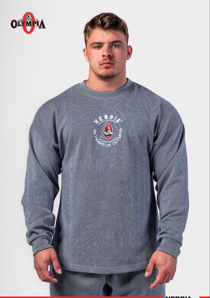 Front view of NEBBIA 797 Oversized Pullover in Deep Blue with prominent white signature embroidery and relaxed fit.